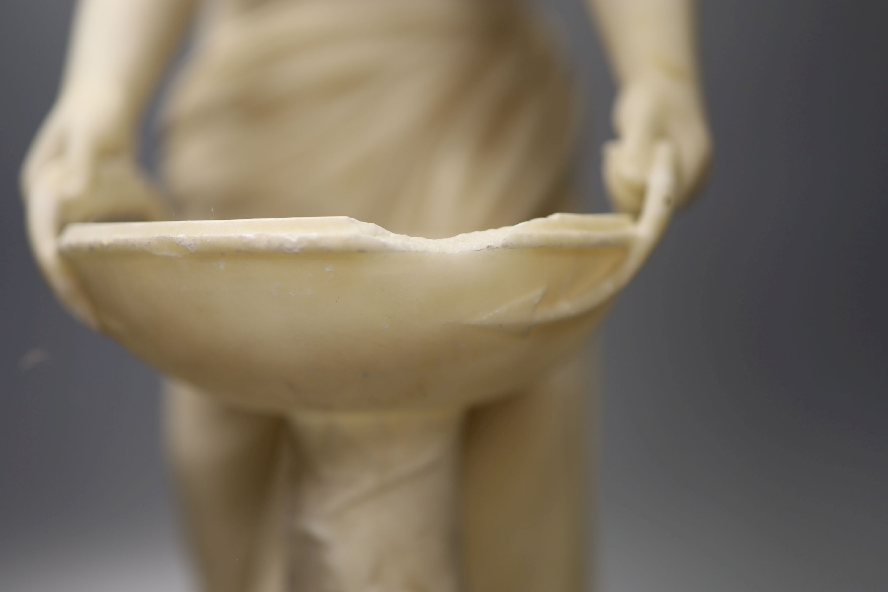 A classical alabaster figure of a water carrier, height 52.5cm
